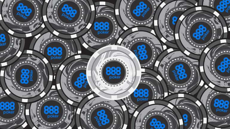 pile of black poker chips with a white chip in the middle