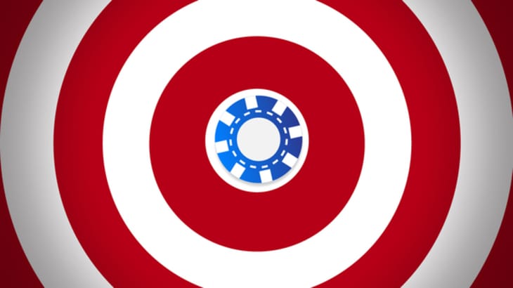 poker chip in the centre of a wide target