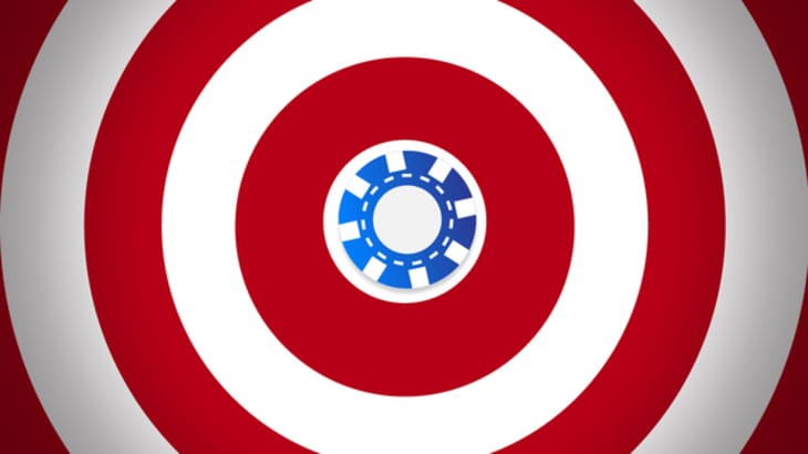 poker chip in the centre of a wide target