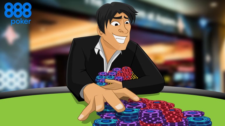poker player hogging huge pile chips at a poker table