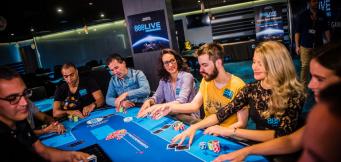 9 players at a poker table with three of them crossed out