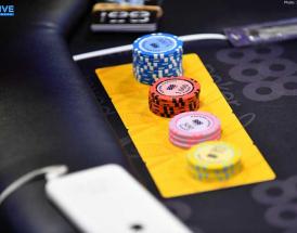 poker table with pile of chips