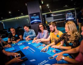 9 players at a poker table with three of them crossed out